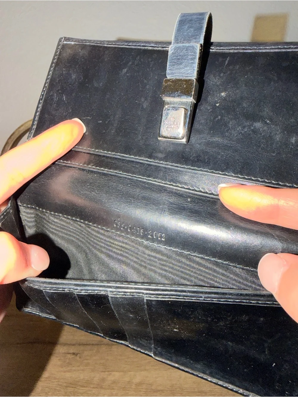 Vintage Gucci black leather wallet gunmetal silver buckle